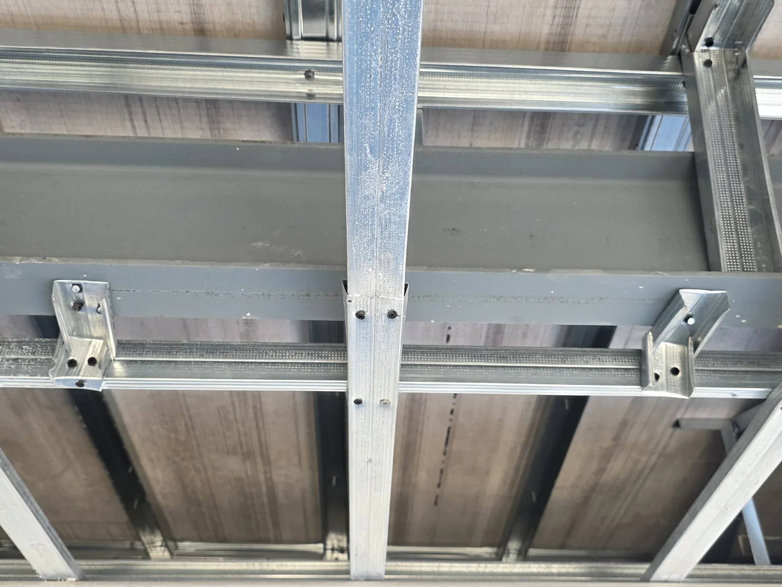 Galvanised steel framing installed for ceilings and wall linings before closing with board