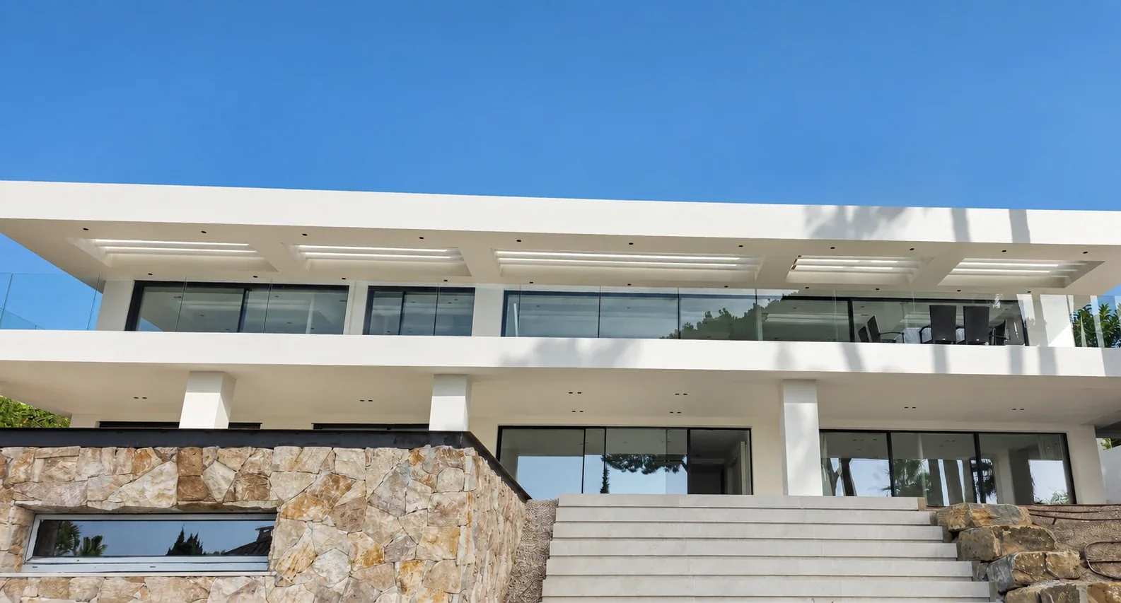 White stone-clad villa